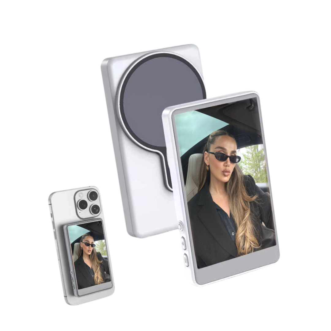 Magnetic selfie monitor attached to the back of a smartphone for filming set up.
