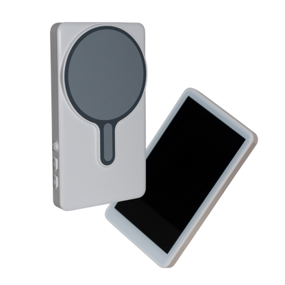 Magnetic selfie monitor attached to the back of a smartphone for filming set up.